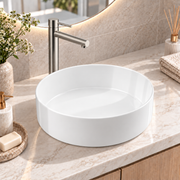 Noxwell AB-3535 gloss white round countertop bathroom basin installed on a vanity