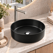 Noxwell AB-3535-B black round countertop bathroom basin on a vanity