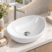 Noxwell AB-4134 gloss white oval countertop bathroom basin installed on a vanity